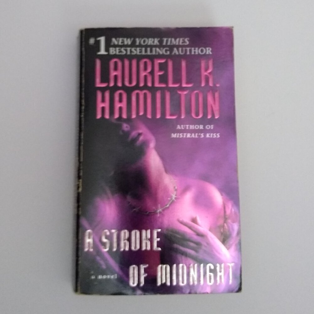 A Stroke of Midnight (Merry Gentry #4) Laurell K. Hamilton PAPERBACK